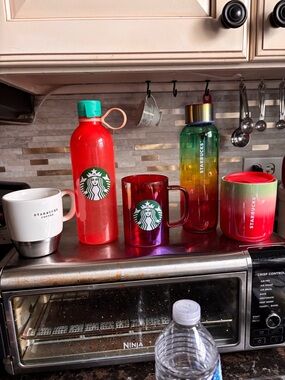 Starbucks Red peach green logo water bottle great condition